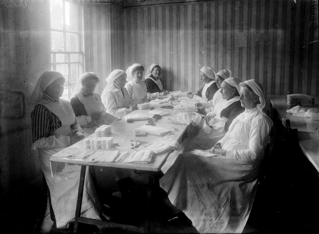 Nurses rolling bandages at the Royal Cornwall Infirmary, possibly in late 1918. Photographer: A W Jordan.